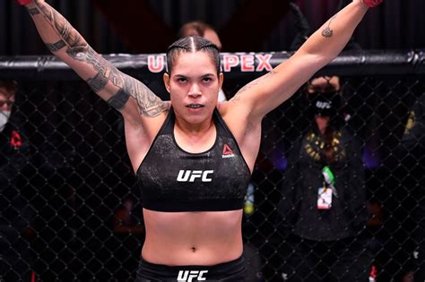LAS VEGAS - The Amanda Nunes vs. Julianna Pena women's bantamweight title fight is official for UFC 269.. Reigning two-division champion Nunes (21-4 MMA, 14-1 UFC) and "The Ultimate Fighter" winner Pena (10-4 MMA, 6-2 UFC) successfully made weight on Friday morning for the title bout, which was originally supposed to happen in August before "The Lioness" contracted COVID-19.